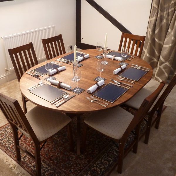 Extending Dining Table in 'dining' format set for six diners