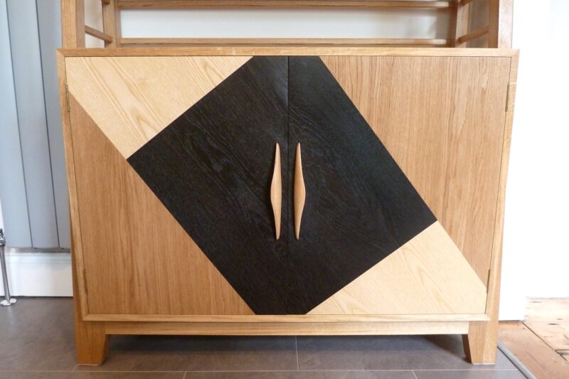 close-up of oak dresser doors with pattern